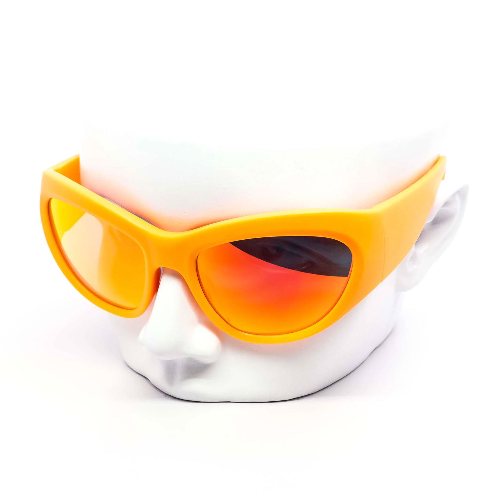 Orange sunglasses on a white mannequin head with a white background